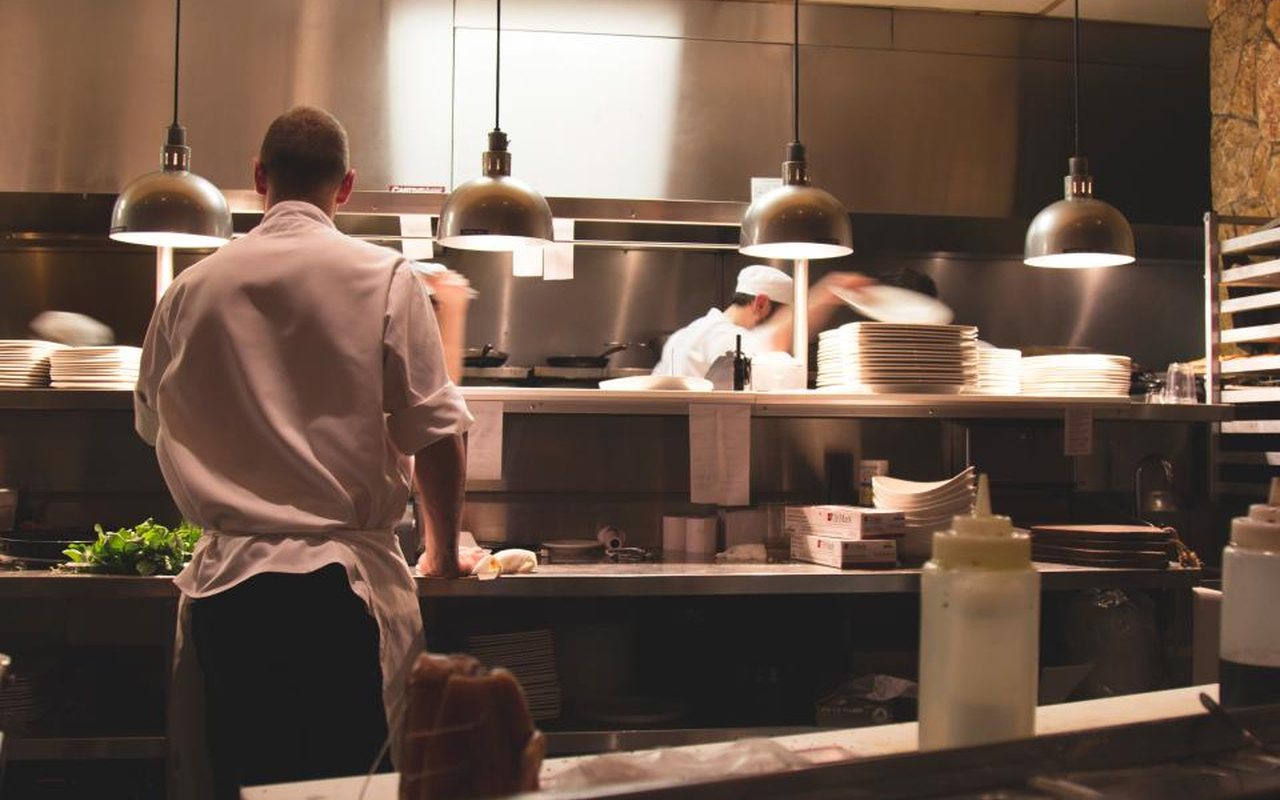Stainless steel commercial restaurant kitchen, the setting for a documented commercial pest control program